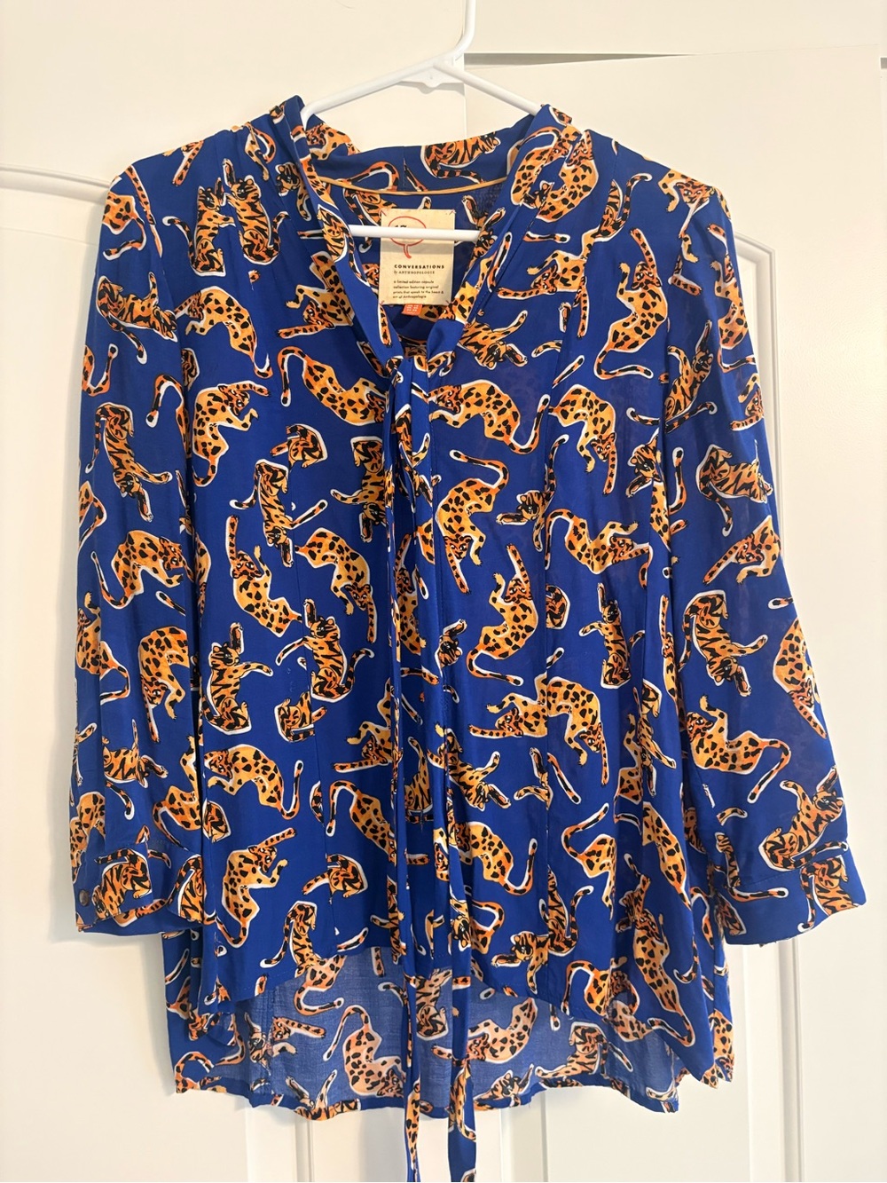Anthropologie Royal Blue & Golden Leopard Tie-Neck Blouse